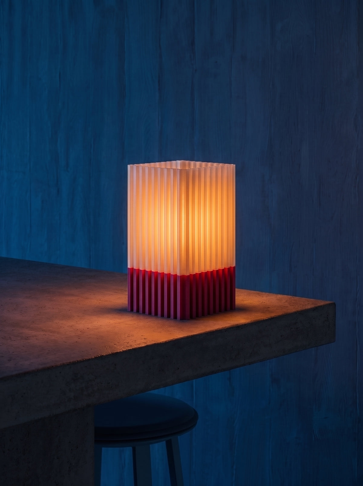 Ember table lamp glowing at night